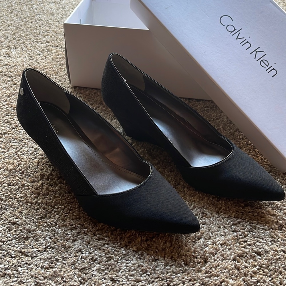 Brand new, without tags but never worn. Always kept in original box.